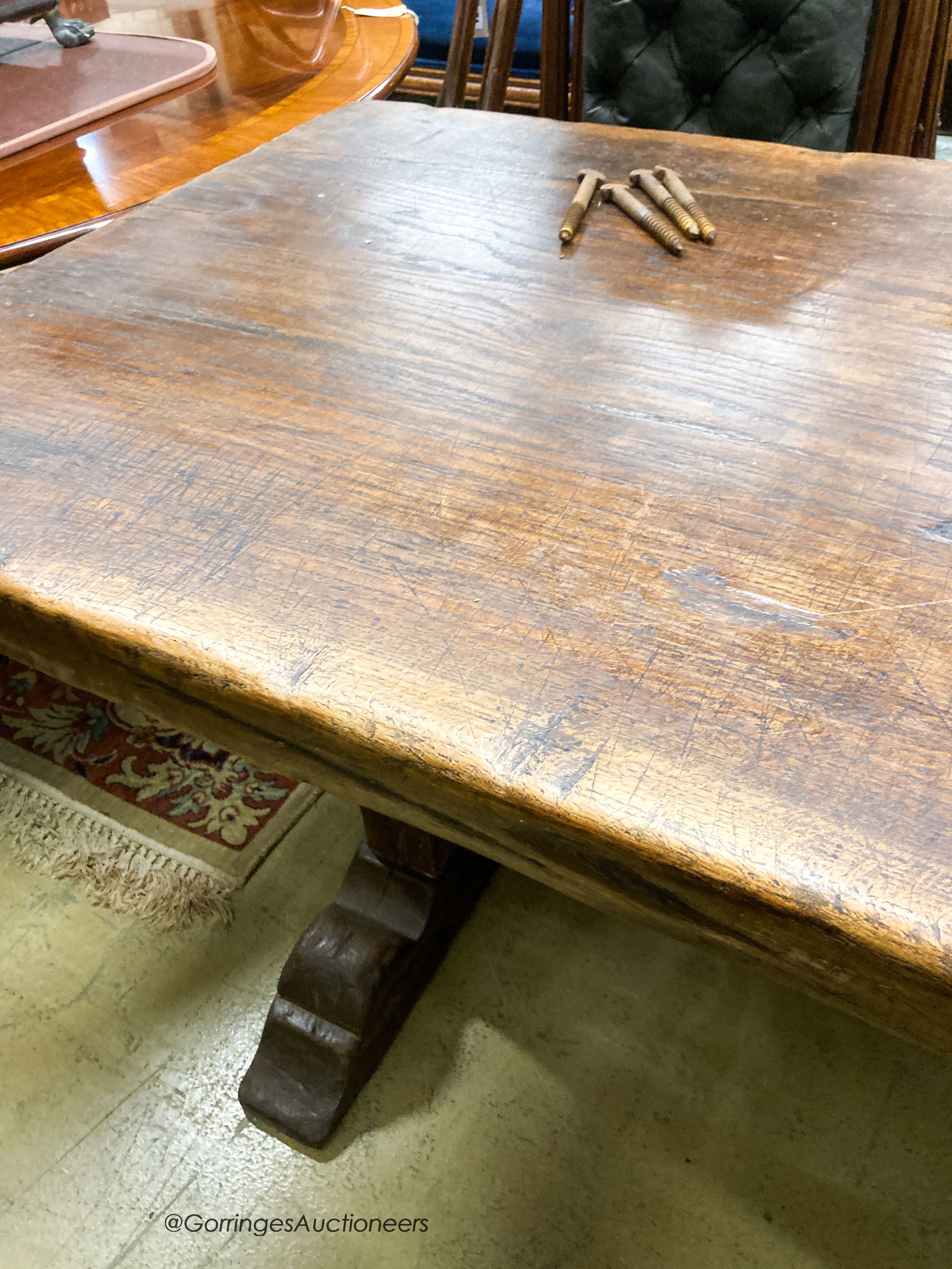 An oak single plank farmhouse table, late 19th century, width 220cm, depth 74cm, height 74cm